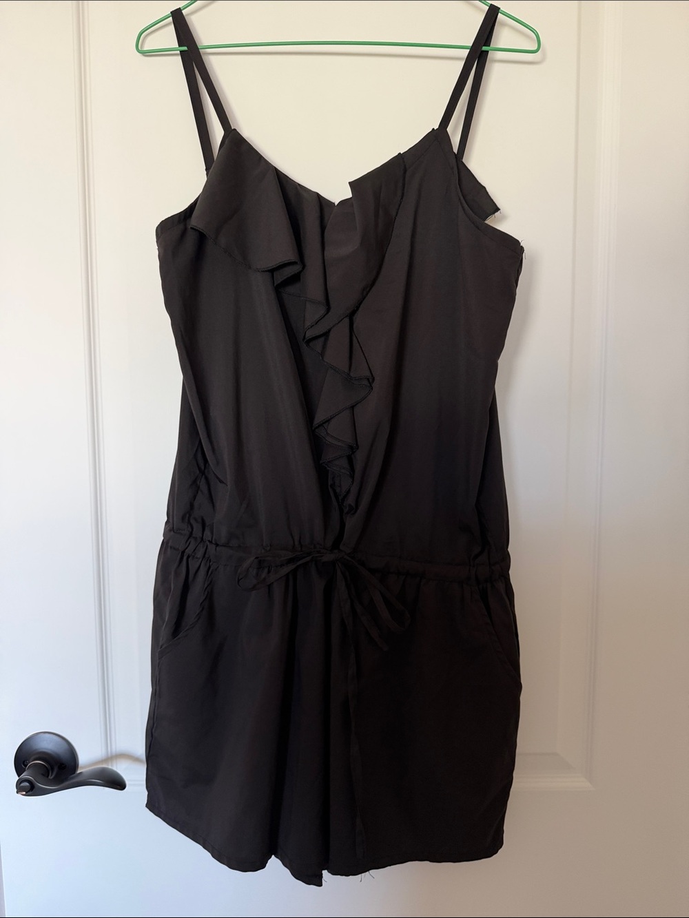 Black Ruffle-Front Sleeveless Romper
